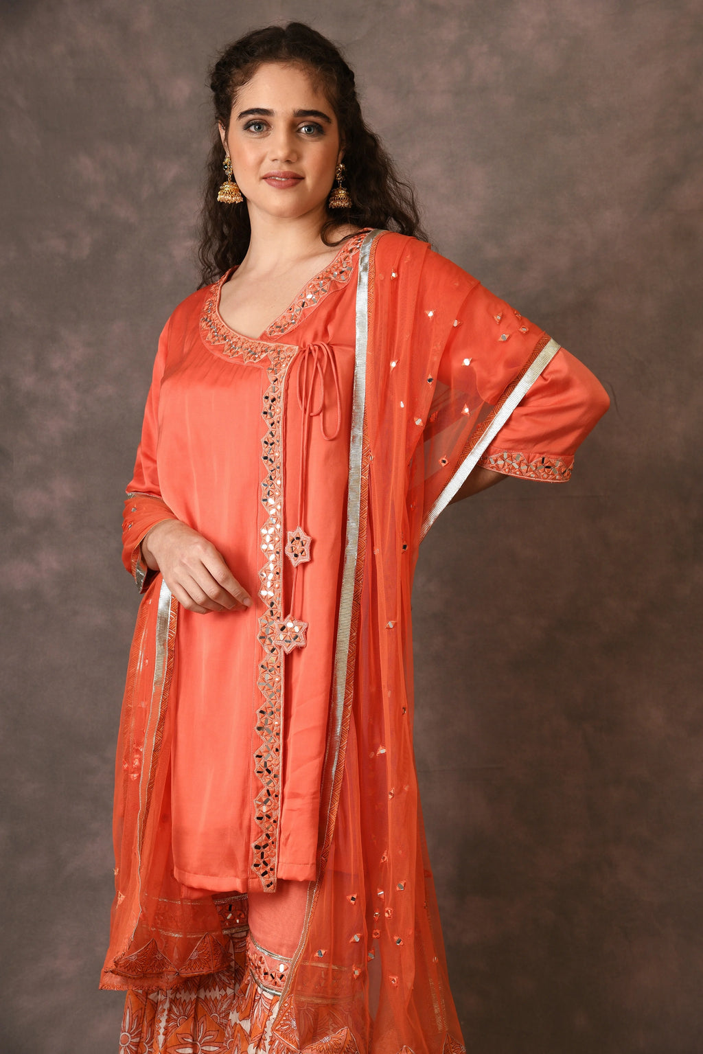 Orange Flame Angarkha And Sharara Set With Mirror Embroidery And Handblock Printed Temple Flower Moti