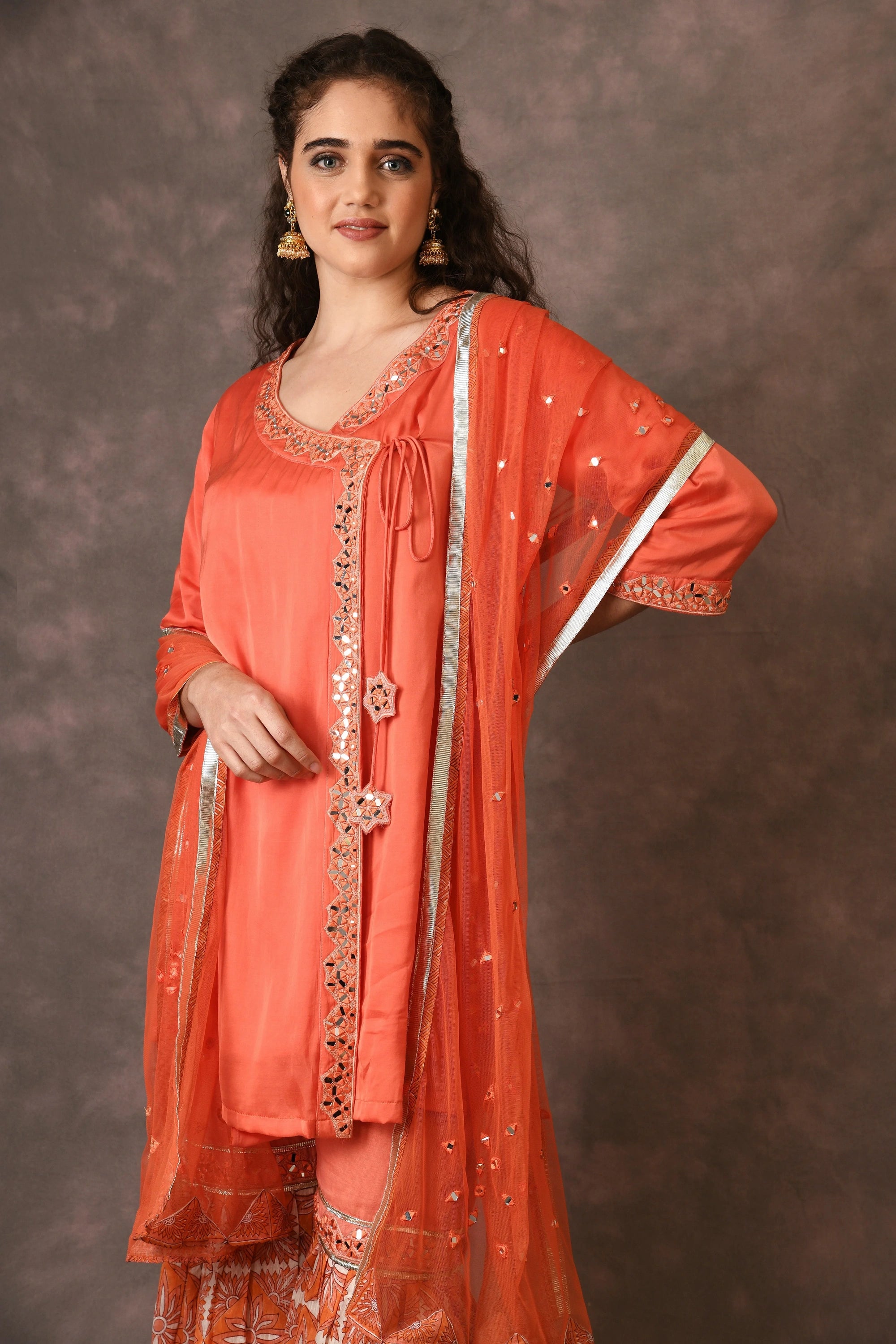 Orange Flame Angarkha And Sharara Set With Mirror Embroidery And Handblock Printed Temple Flower Moti