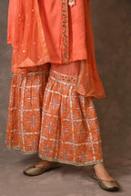 Orange Flame Angarkha And Sharara Set With Mirror Embroidery And Handblock Printed Temple Flower Moti