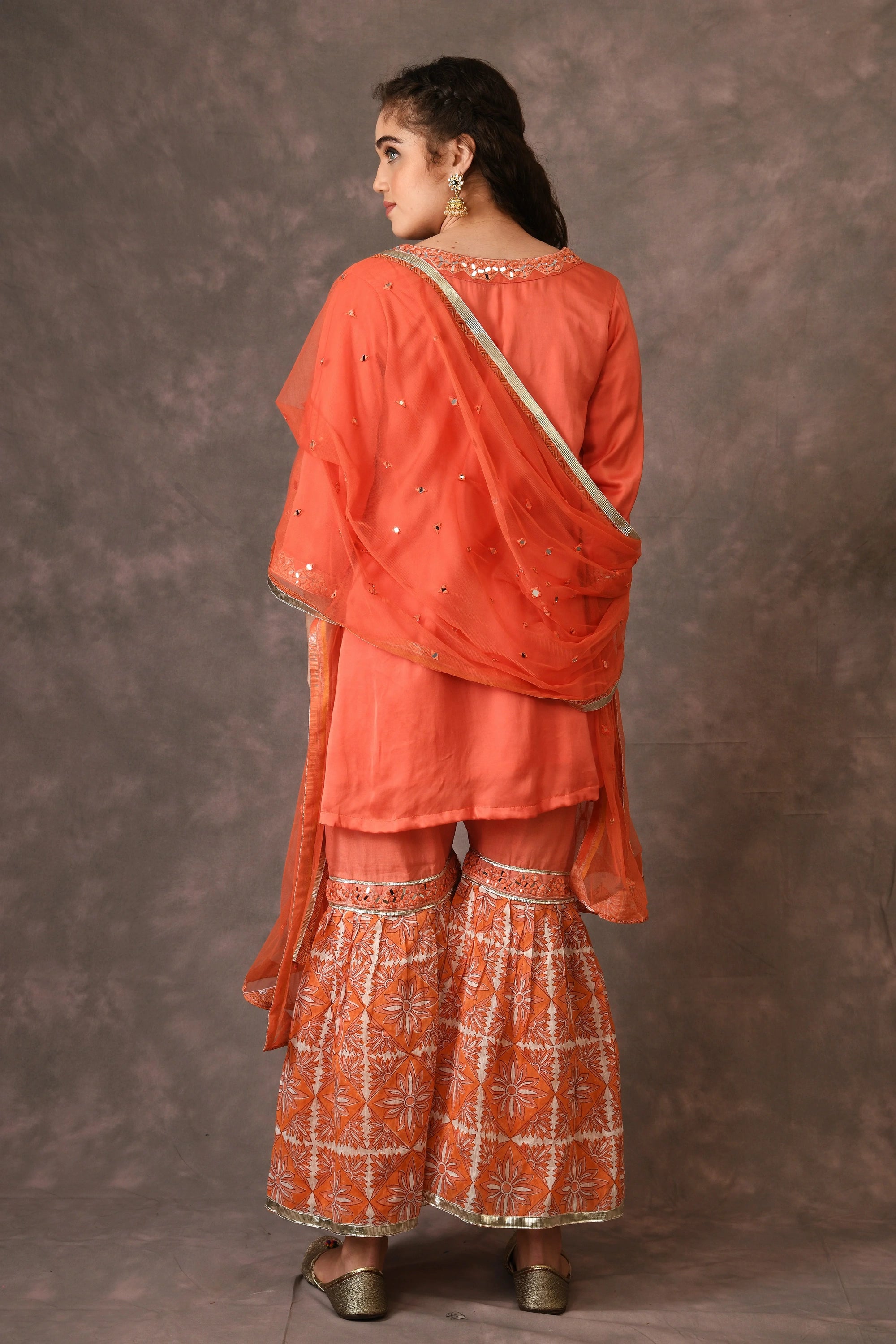 Orange Flame Angarkha And Sharara Set With Mirror Embroidery And Handblock Printed Temple Flower Moti